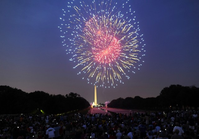 Fireworks illuminate the night sky over